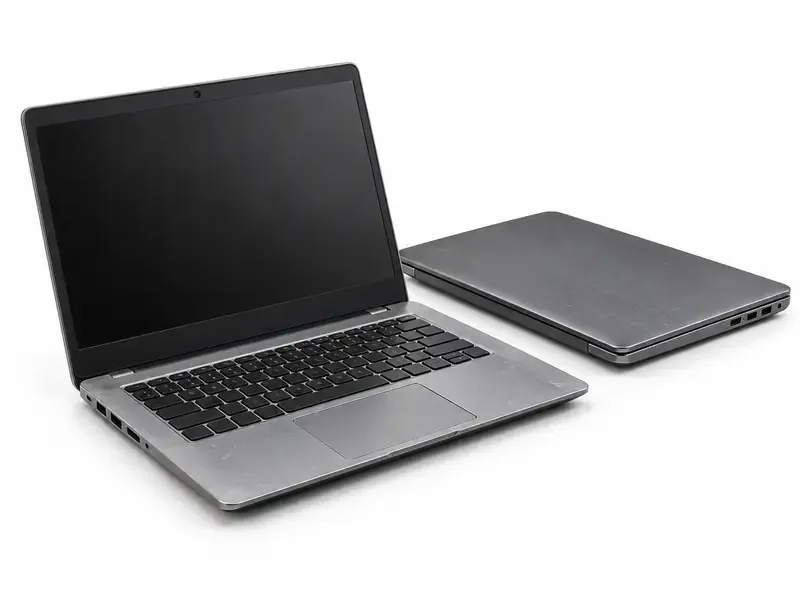 Used laptops arranged for e-waste pickup and recycling evaluation